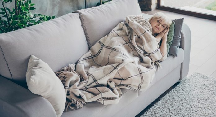 Photo of amazing blond aged granny having daydream lying comfort